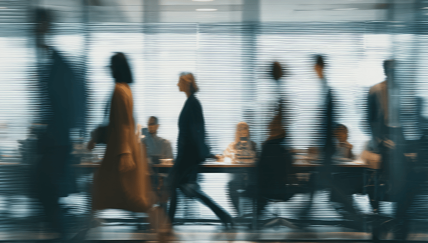 Group of workers walking quickly