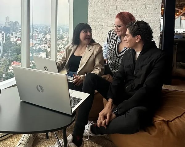 A photo of some Wilson employees having a casual meeting