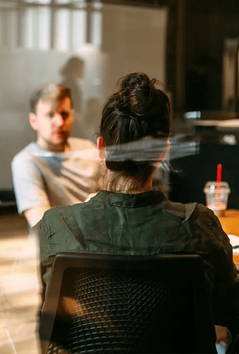 Two colleagues in a meeting