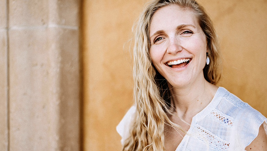Happy Caucasian woman smiling.
