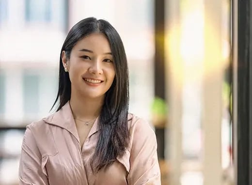 A smiling woman in an office