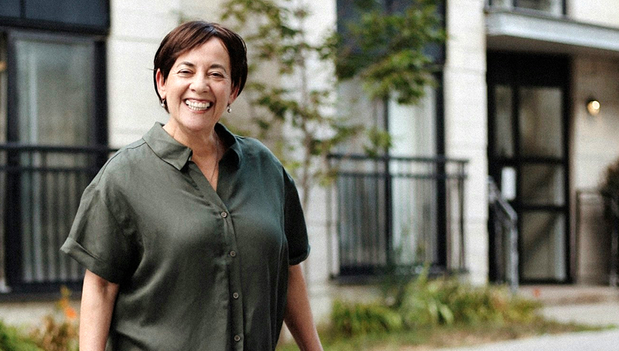 A photo of a smiling woman