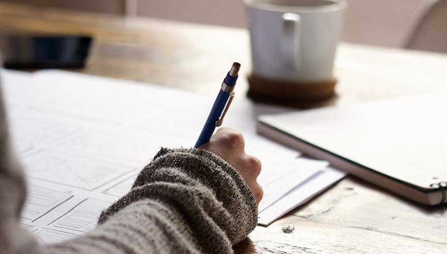 A photo of someone taking notes